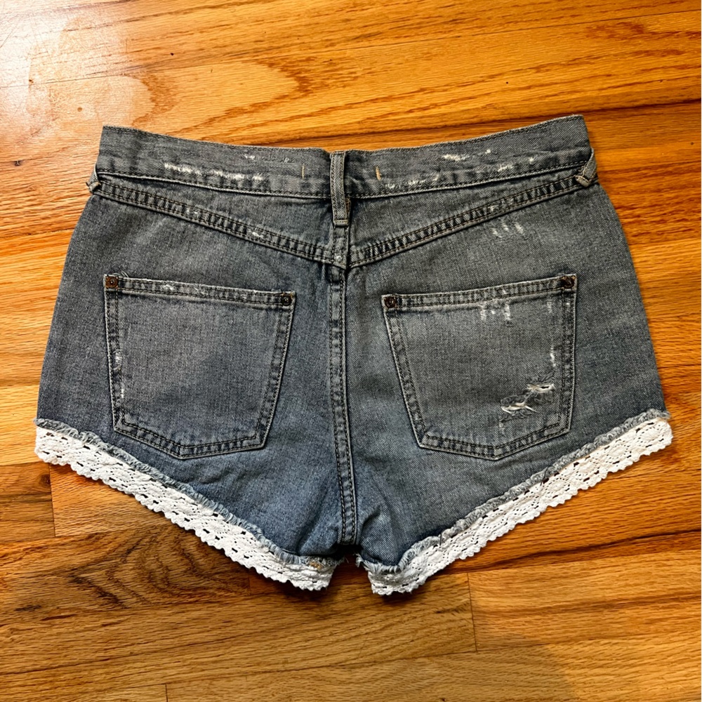 Free People Distressed Denim Shorts with White Lace Trim - Picture 2 of 5